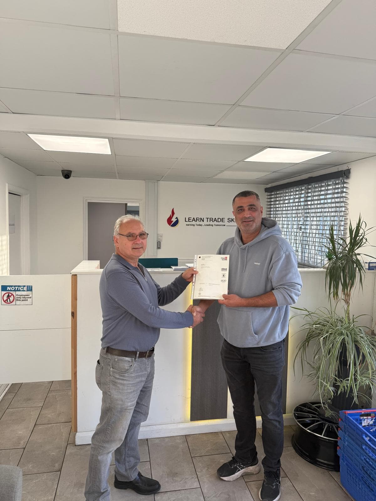 Student certificate handover at Learn Trade Skills