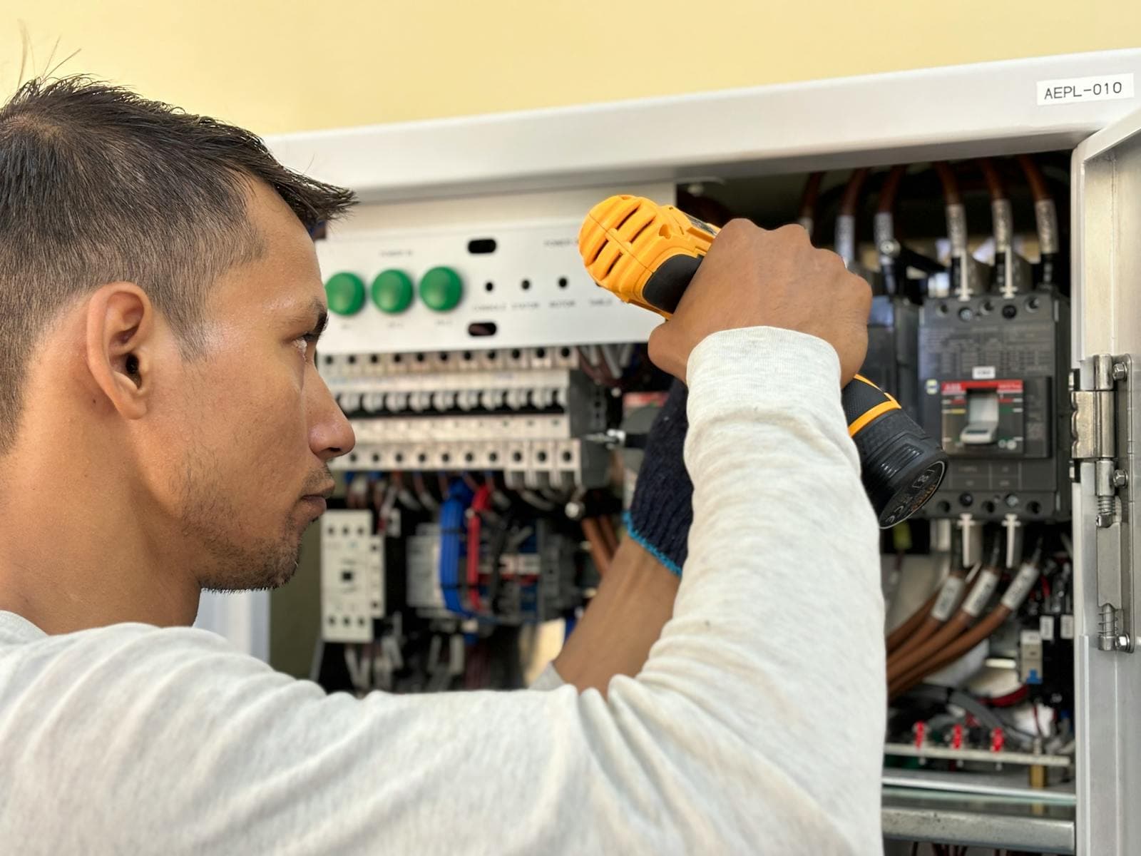 Working electrician on a permanent rig at the Cheshunt centre