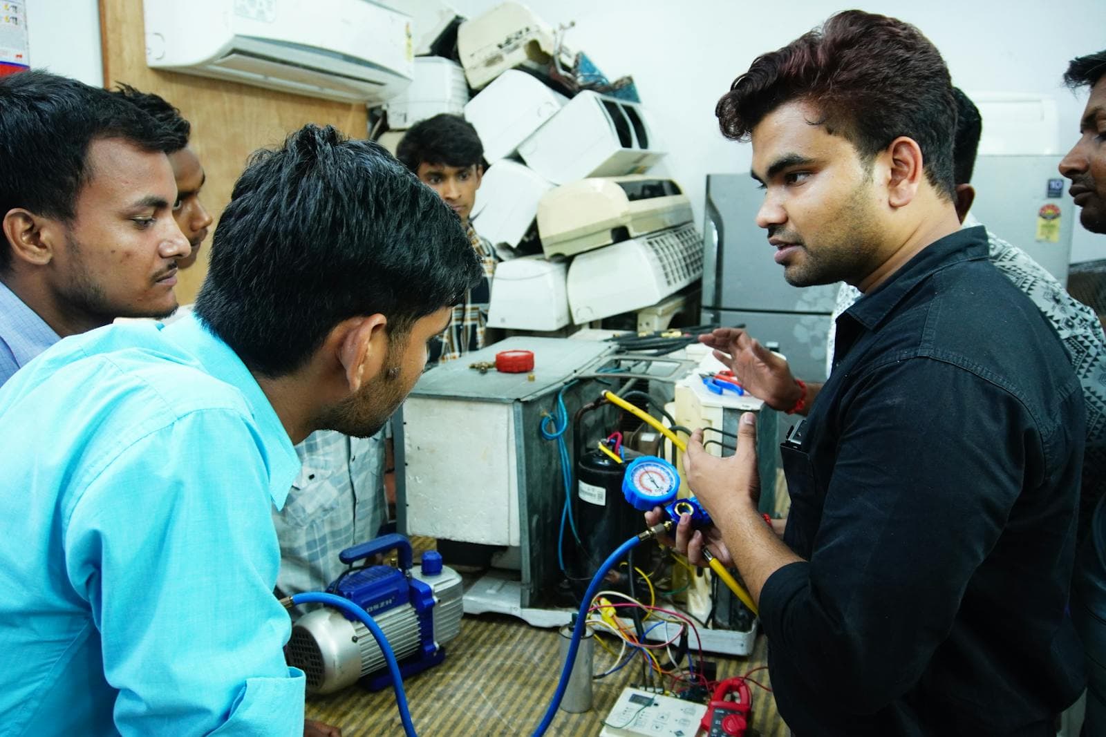 Hands-on electrical training session with multiple participants