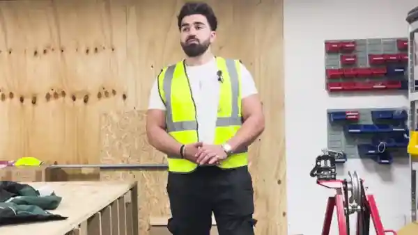 Baran, a Turkish Kurdish electrical student at Learn Trade Skills in Cheshunt, giving his testimonial in the training workshop